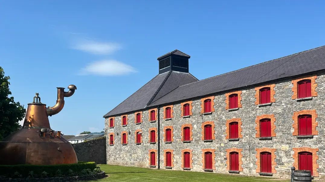 Brewery Building exterior with large copper equipment outside