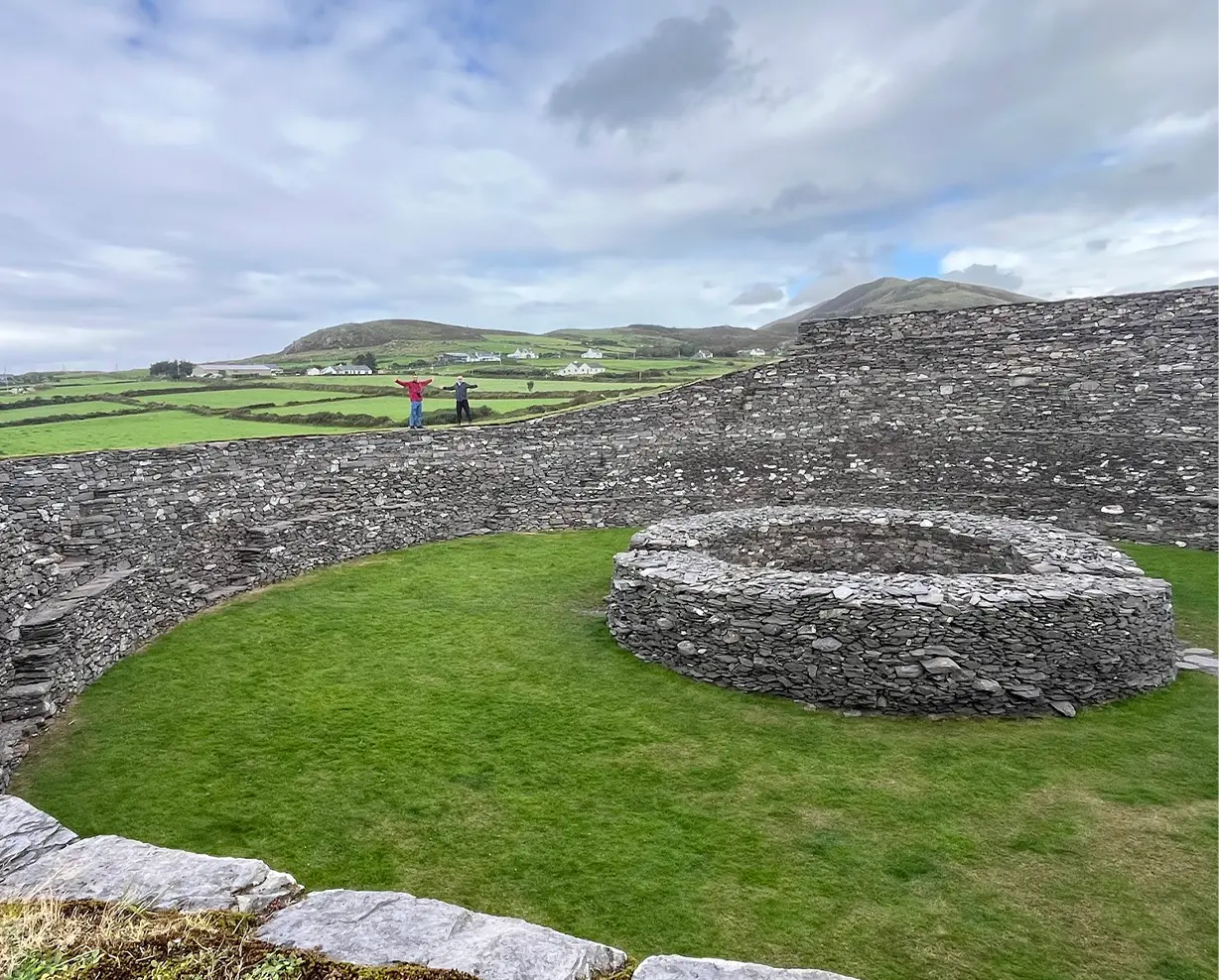 Tour members standing on ancient Irish ring fort