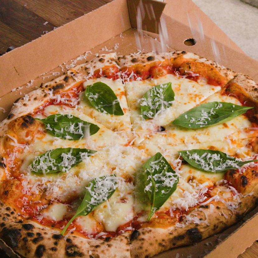 Tasty pizza in pizza box