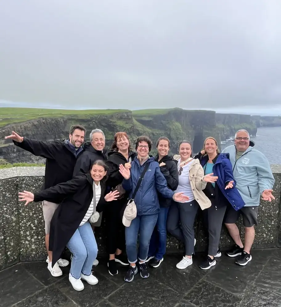 Tour group in front of cliffs of Moher