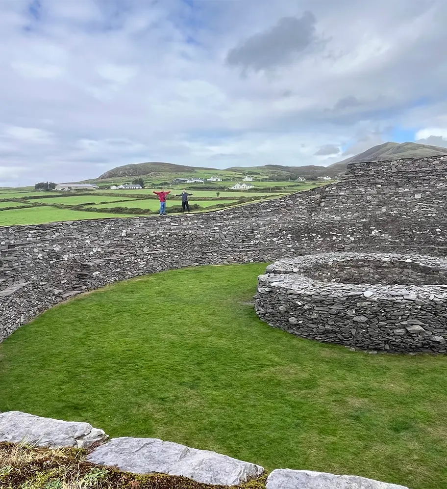 Tour Goers stand on ancient Irish ring fort