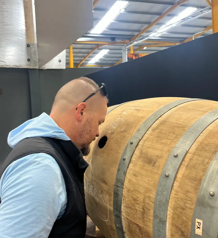 Jason and Ryan having a sniff of the PX sherry barrel at Skellig Six Brewery
