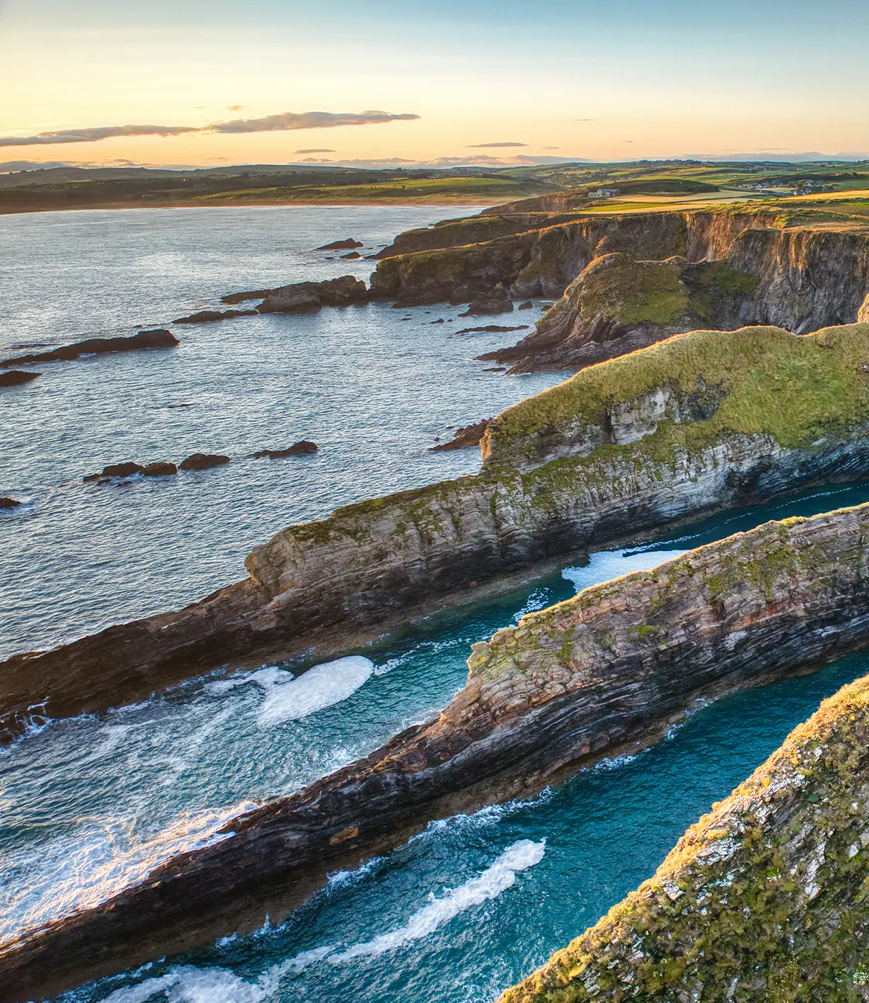 Dramatic cliffs jutting into sea