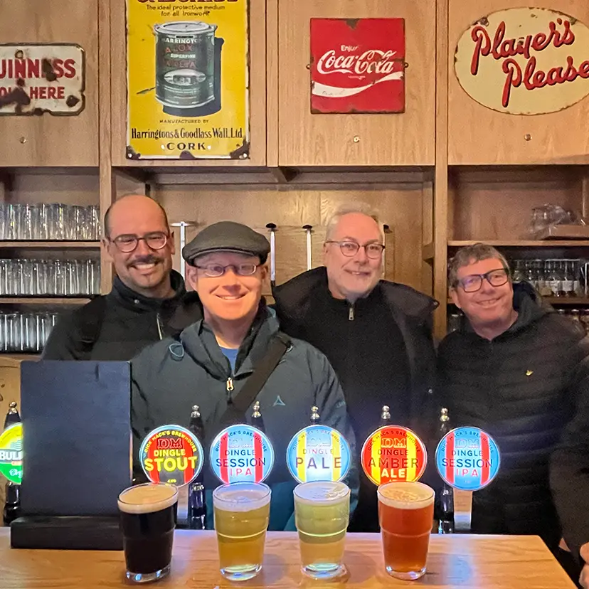 Group Behind The Bar with Pints
